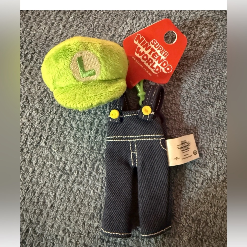 Super Nintendo World Universal Studios Luigi overalls hat plush keychain.